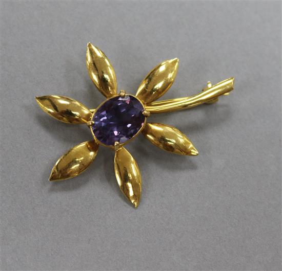 A 9ct gold gem set flower brooch, 47mm.